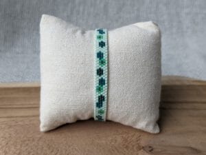 Weef armband bloem mintgroen-petrol (zilver)